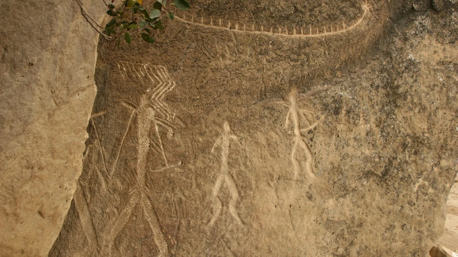 Ancient rock carvings of human figures at Gobustan National Park, a UNESCO World Heritage Site south of Baku