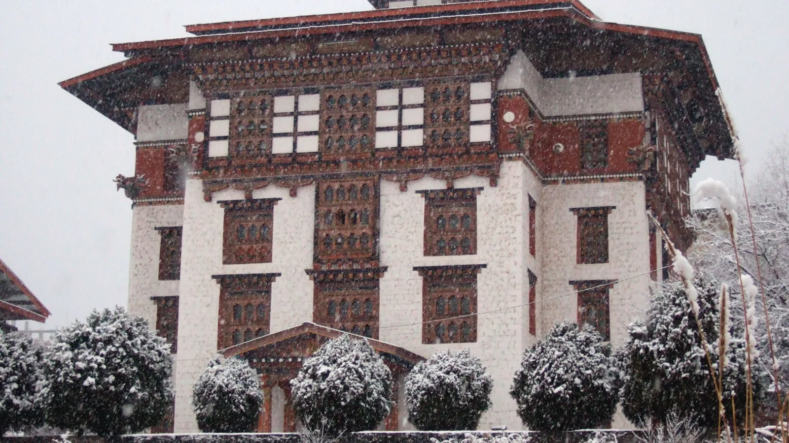 A traditional building with carved and painted woodwork in Thimphu, Bhutan's capital