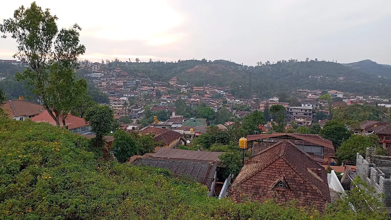 The town of Madikeri seen from the old fort, spread across the green hills of Kodagu