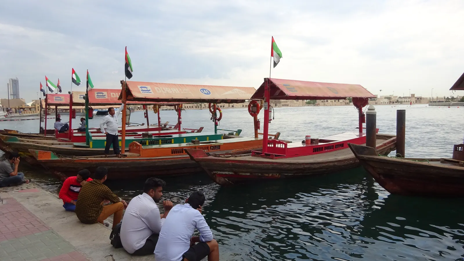 Wooden abra water taxis moored on Dubai Creek, which carry passengers between Bur Dubai and Deira