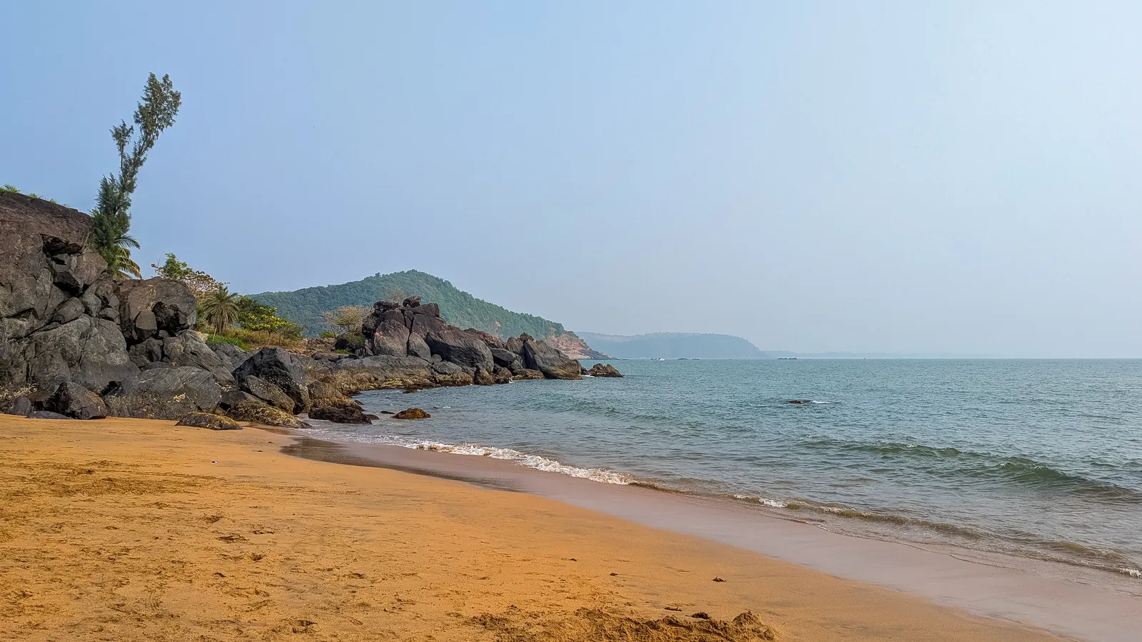 The small secluded cove of Half Moon Beach in Gokarna