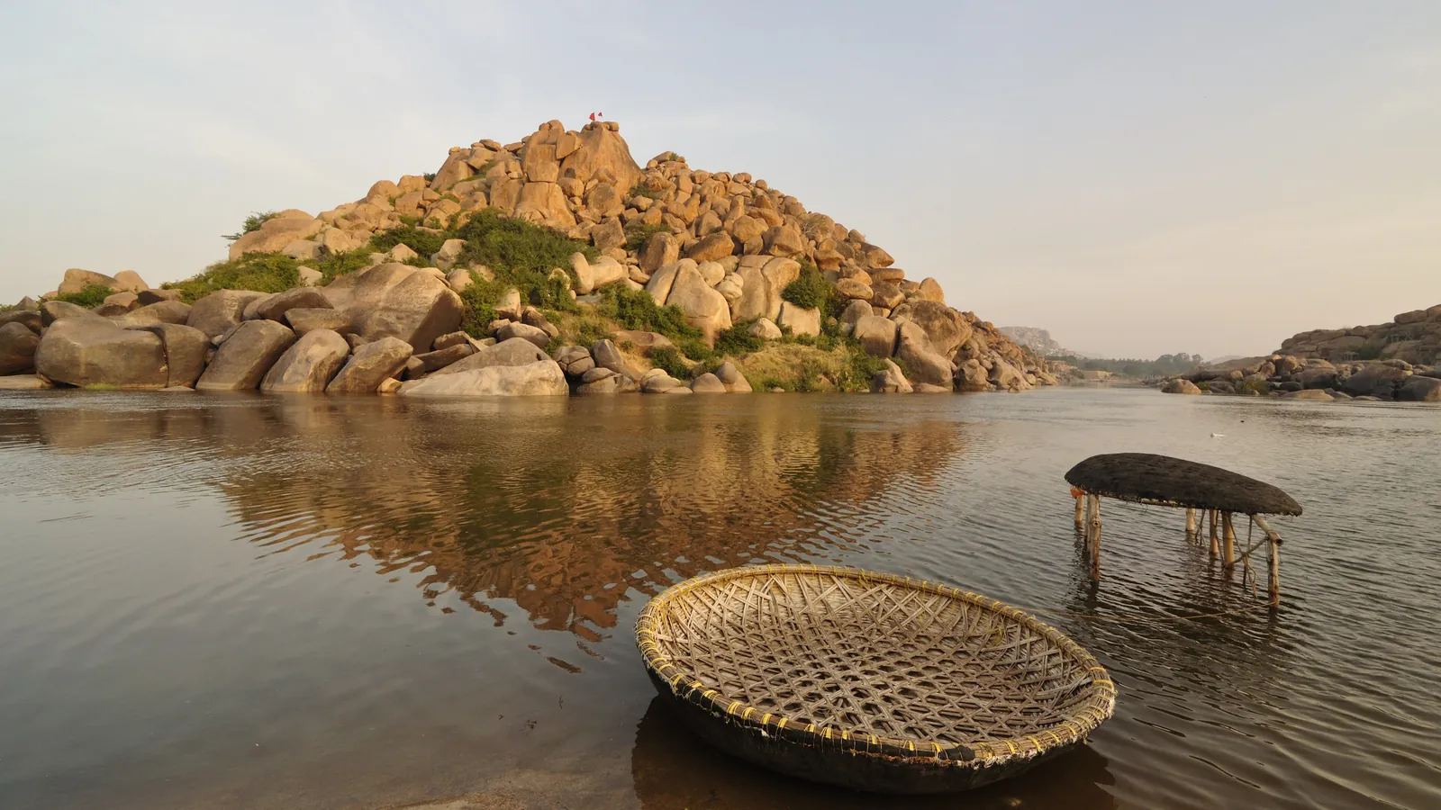 Round coracle boats on the Tungabhadra River at Hampi