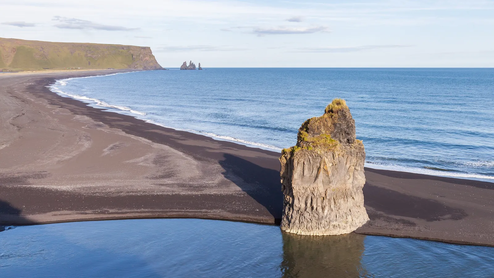The black sand and basalt sea stacks of Reynisfjara beach near Vík