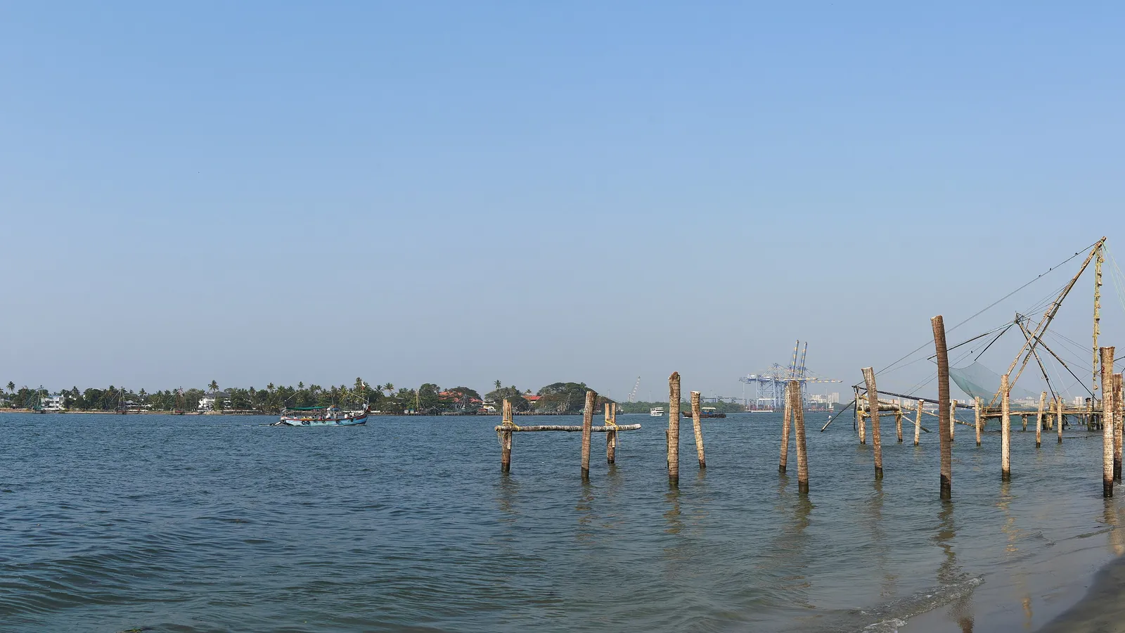 Chinese fishing nets silhouetted against the evening sky at Fort Kochi