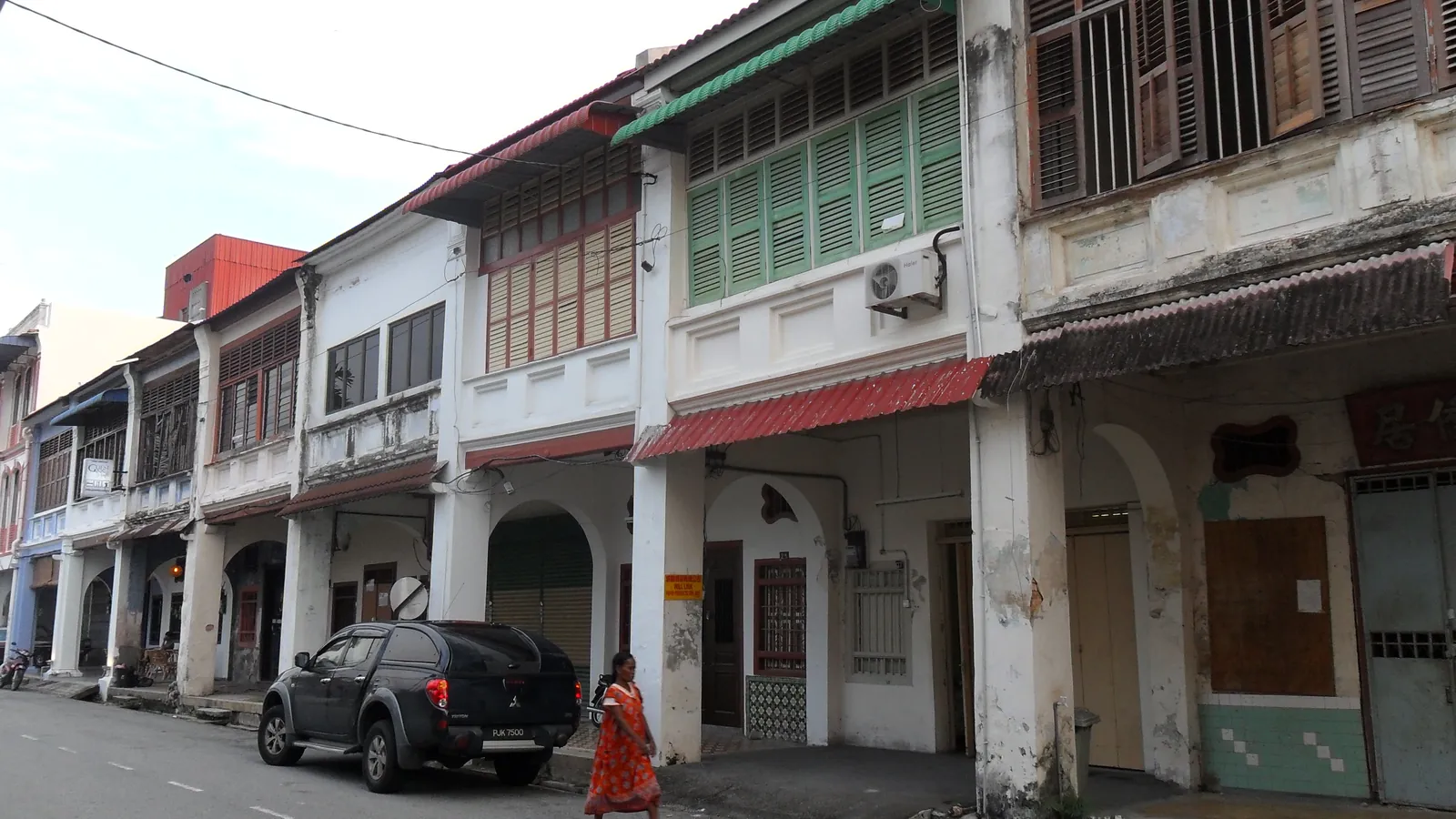 Colonial-era shophouses on a street in George Town, Penang, a UNESCO World Heritage Site