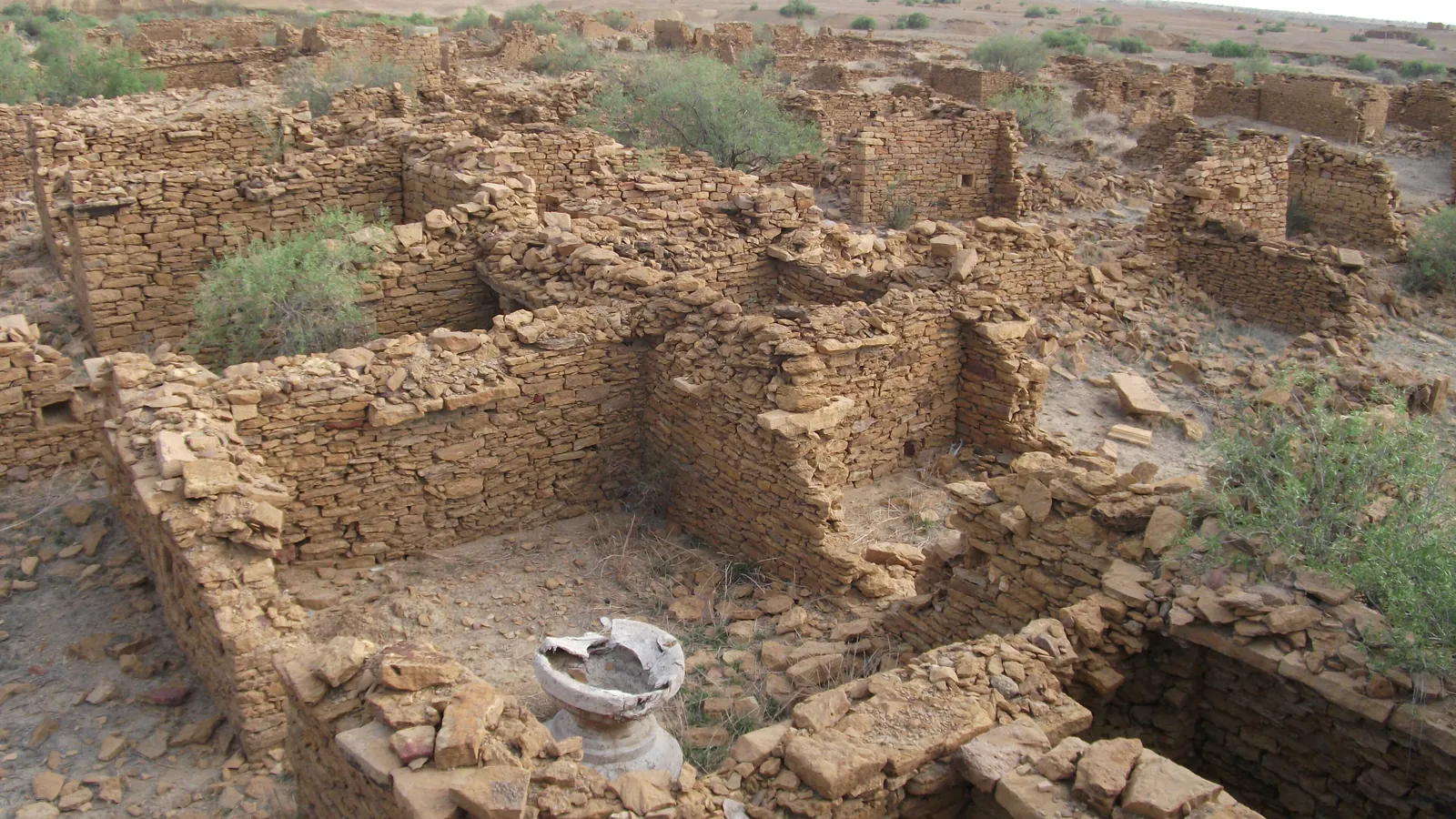 The roofless sandstone ruins of Kuldhara near Jaisalmer, abandoned by its Paliwal Brahmin inhabitants around 200 years ago
