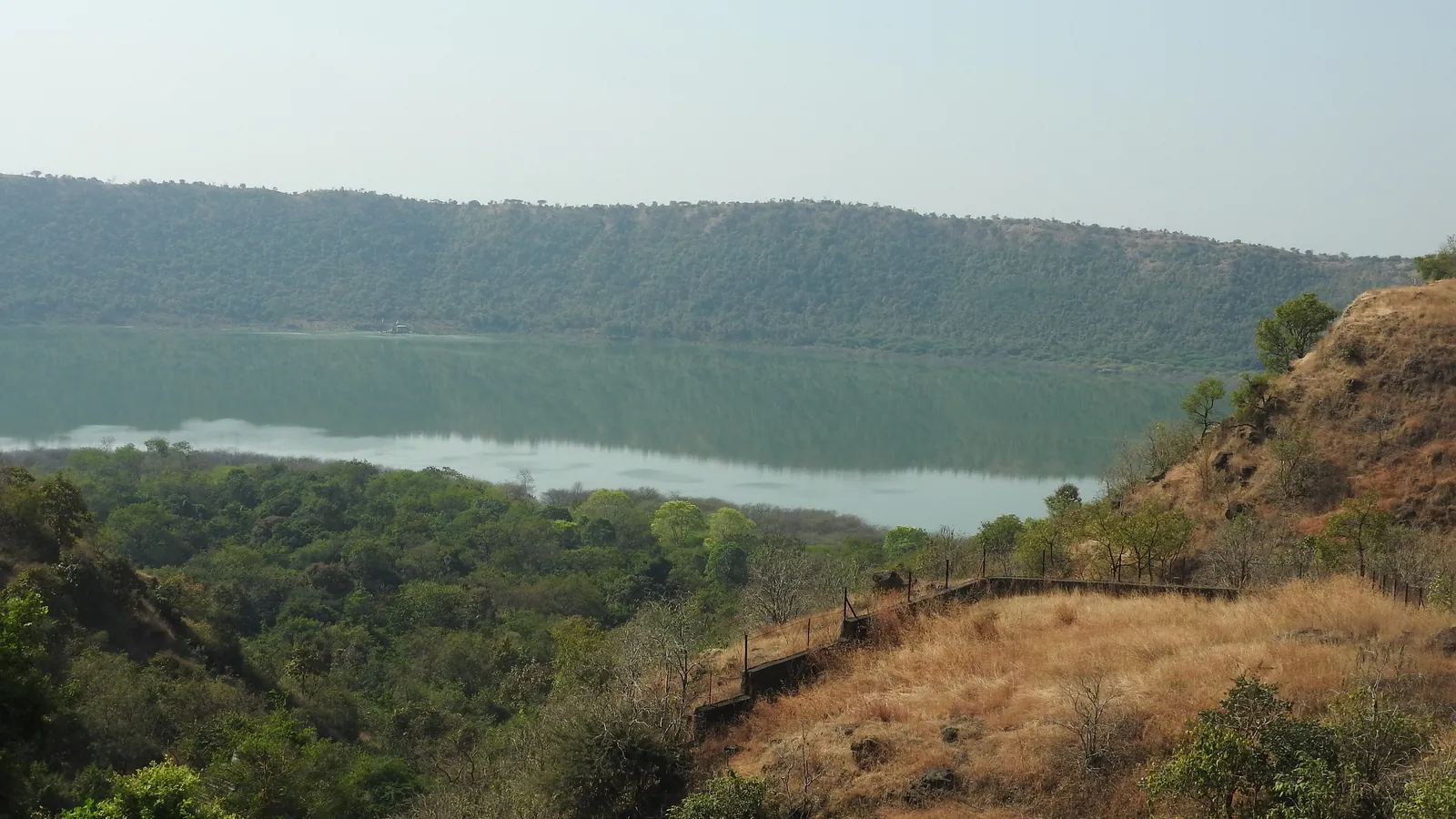 Lonar Crater in Maharashtra, a meteorite impact crater in basalt rock that holds a salty, alkaline lake