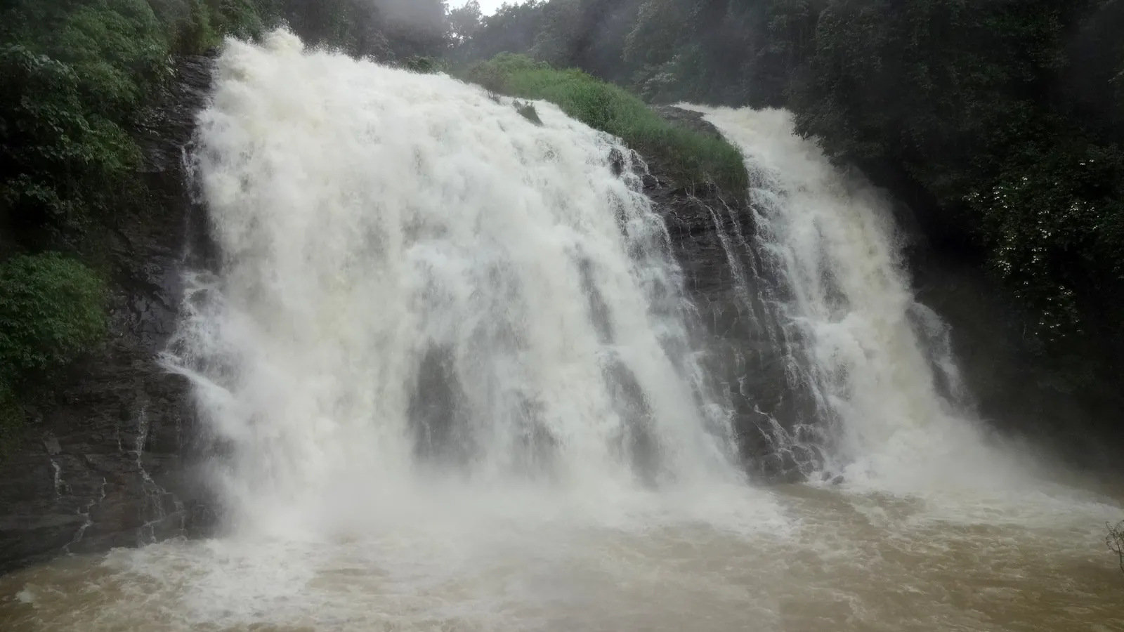 Pykara Falls cascading over rocks in the Nilgiri hills near Ooty