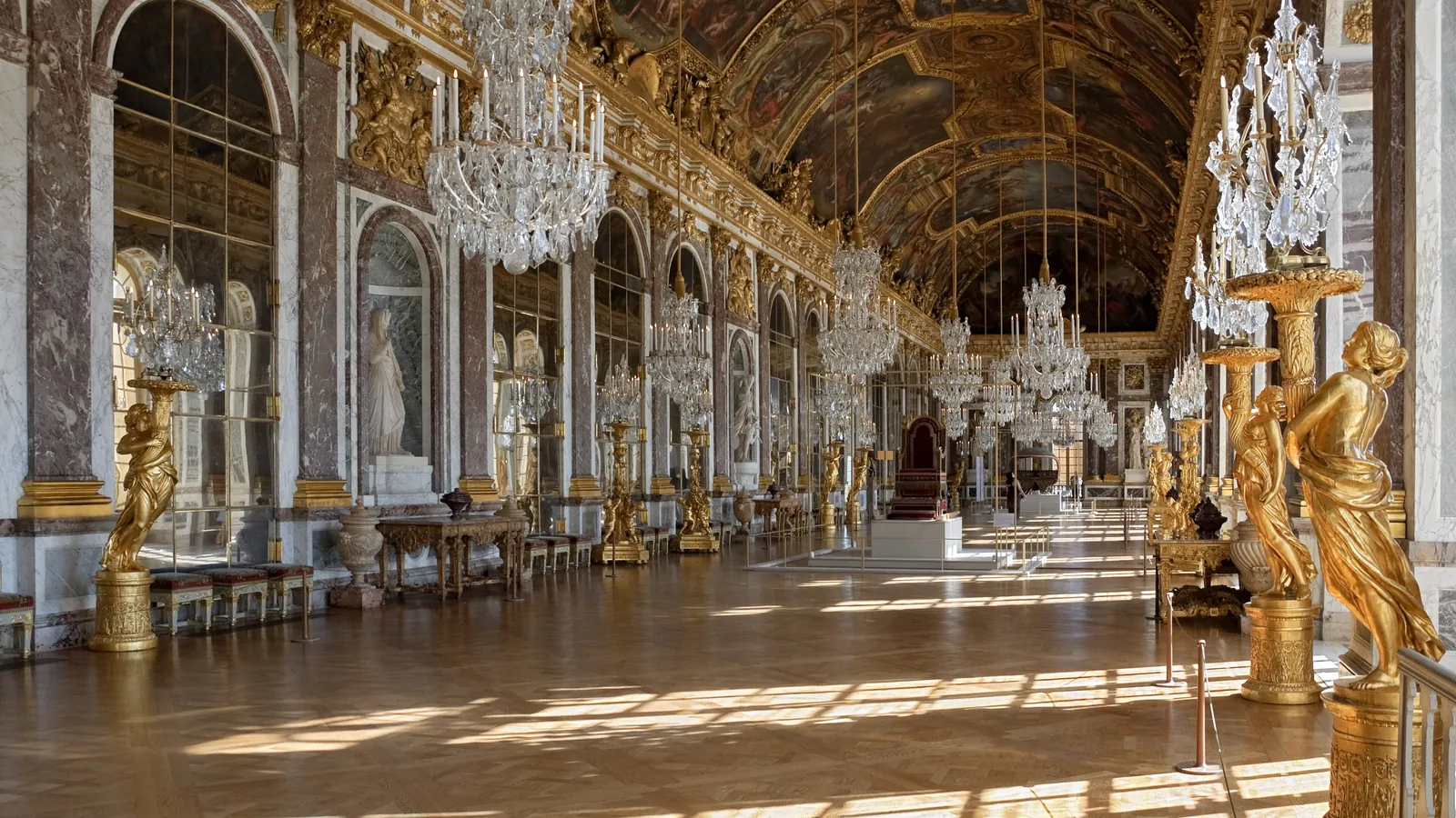 The Hall of Mirrors at the Palace of Versailles, lined with mirrors and chandeliers