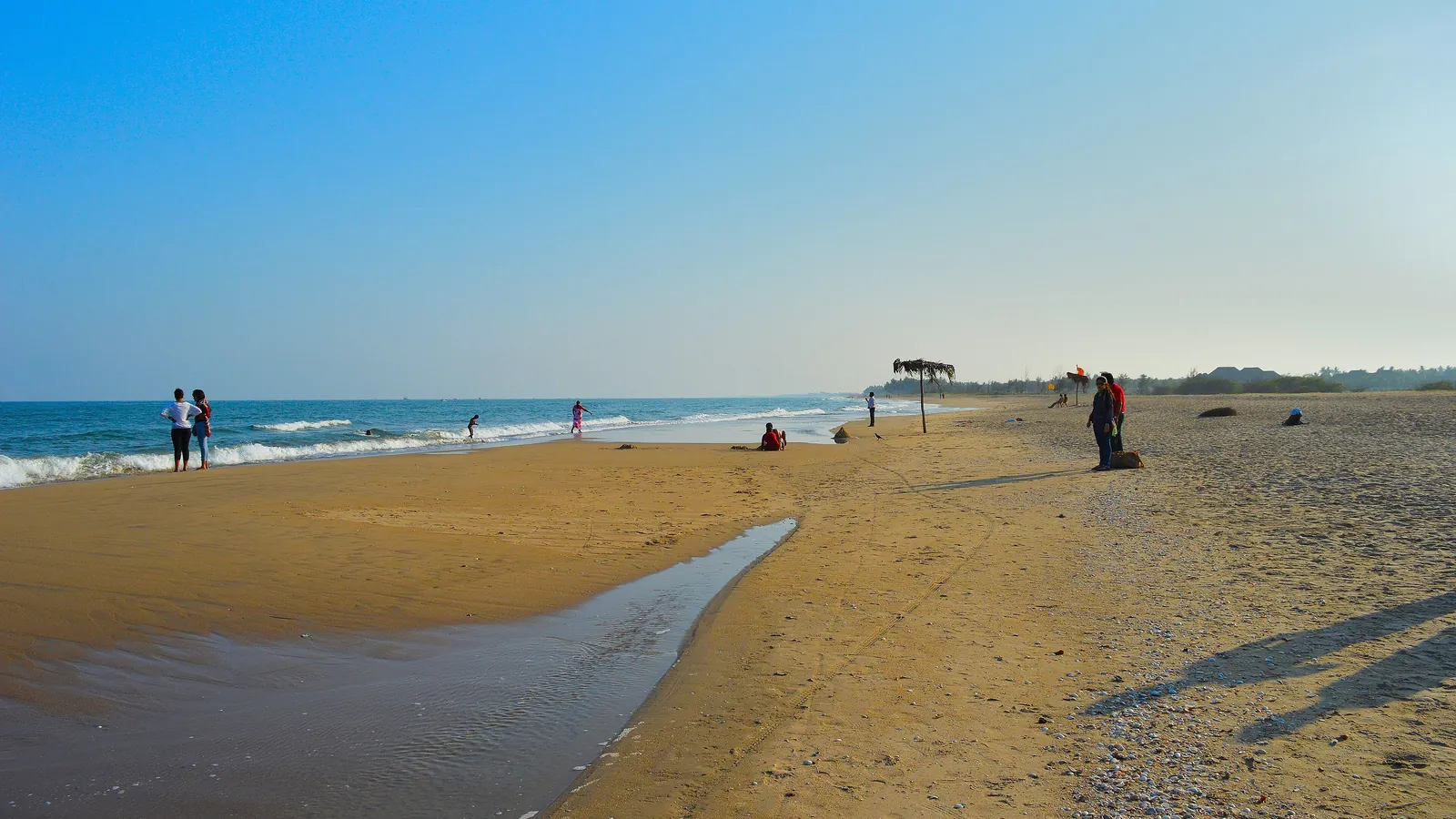Golden sand and calm water at Paradise Beach near Pondicherry