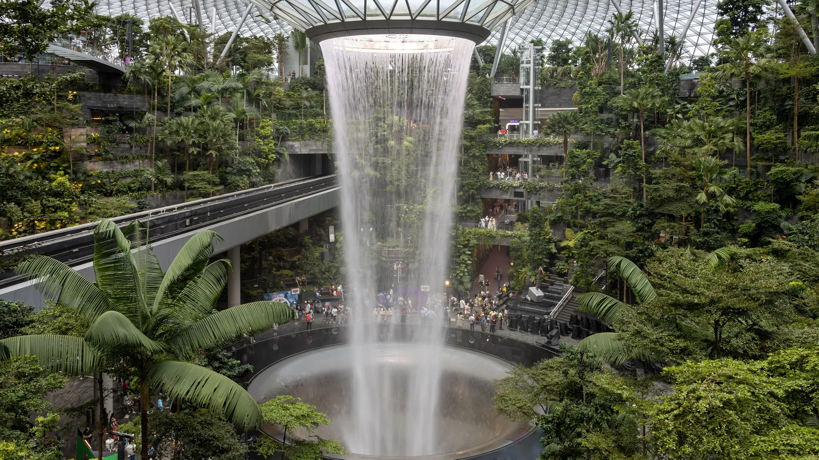 The Rain Vortex at Jewel Changi Airport, the world's tallest indoor waterfall, surrounded by a terraced indoor forest