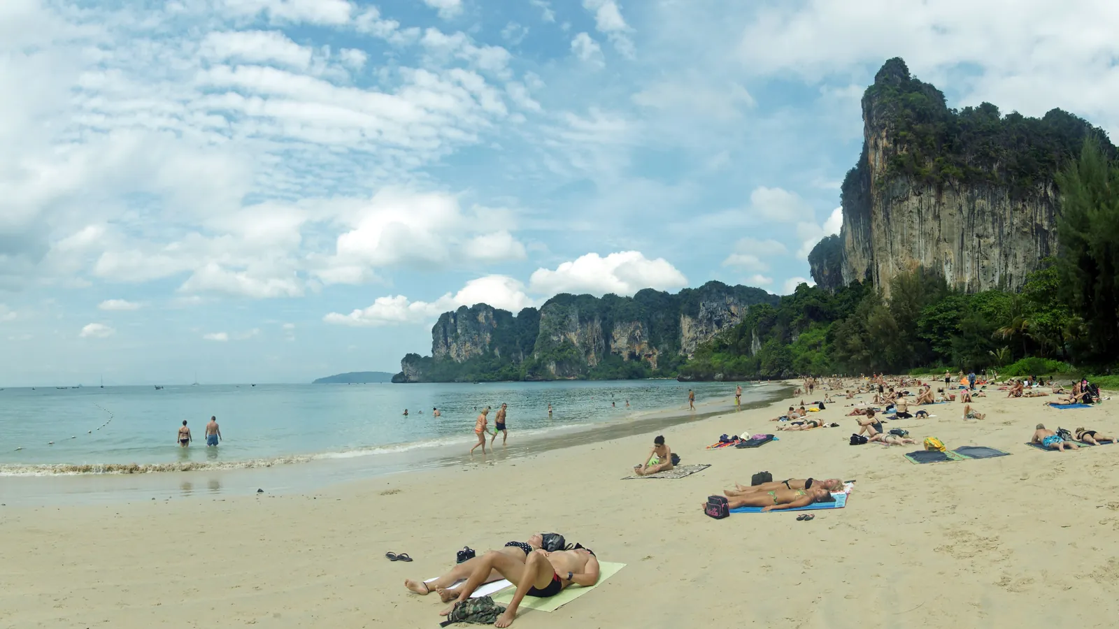 Railay Beach in Krabi, reachable only by boat and backed by dramatic limestone cliffs