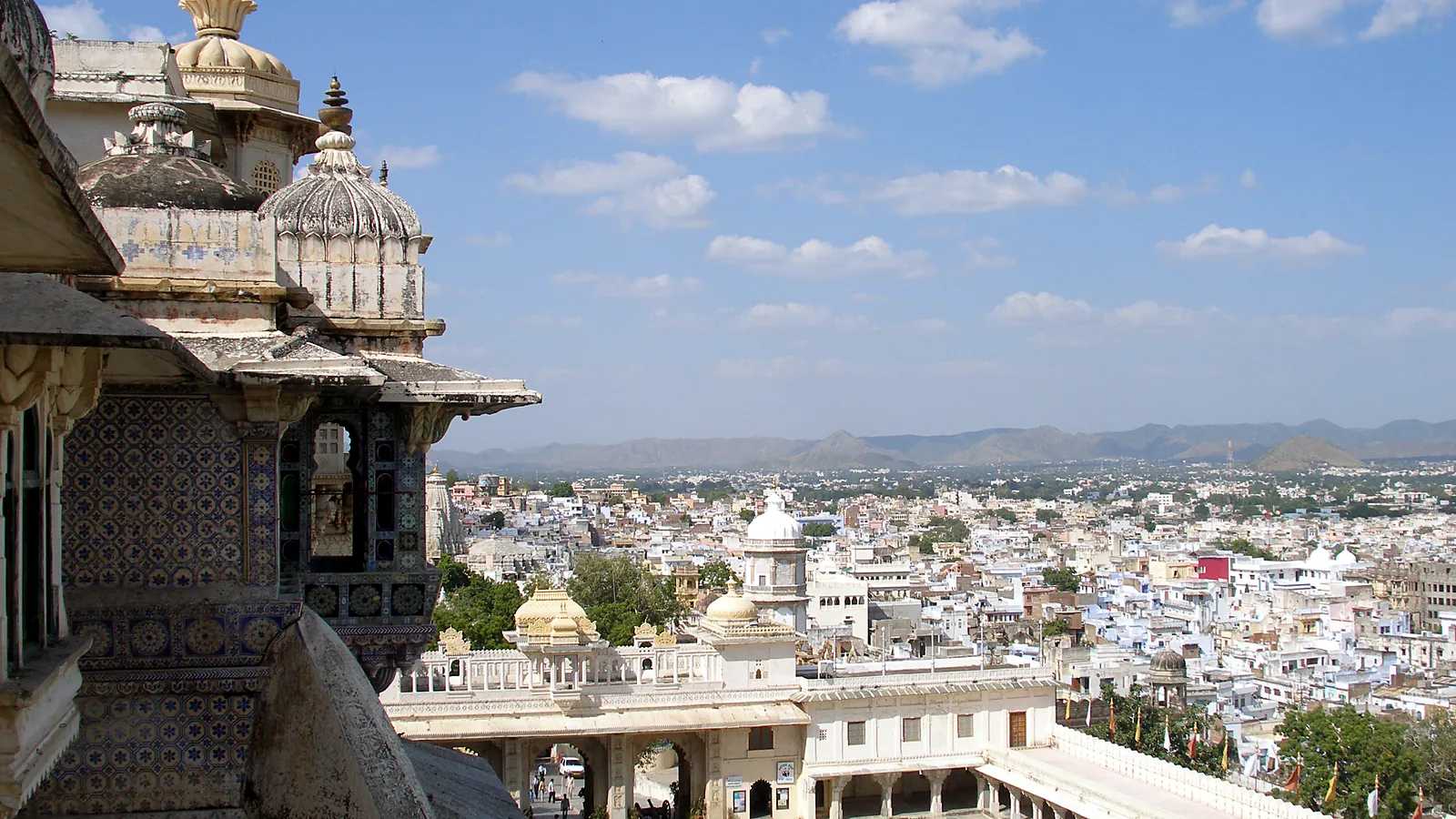 Carved balconies and domed pavilions of the City Palace, a masterpiece of Rajput and Mughal architecture