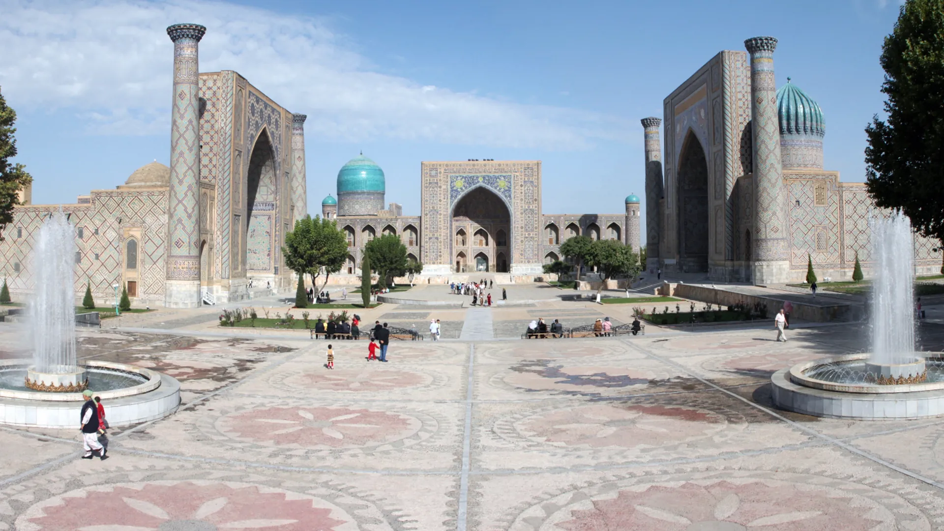 The Registan in Samarkand, framed by three great madrasas covered in turquoise and blue tiles