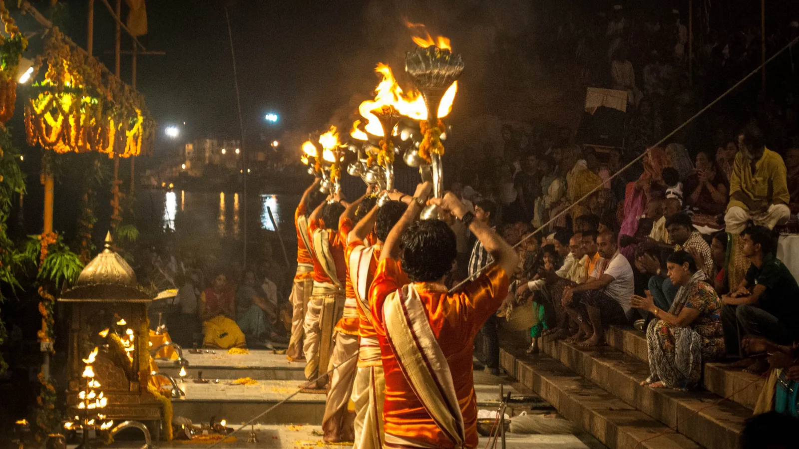 Priests perform the evening Ganga aarti with brass lamps at Dashashwamedh Ghat
